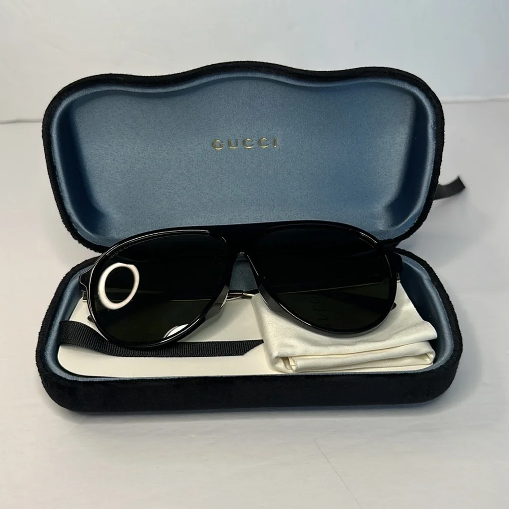GUCCI GG0829SA 002 aviator sunglass black and ruthenium frame with green lenses.